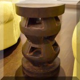 F22. Handcarved wooden side table. 